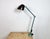Large industrial table lamp with three adjustable joints made by Elektrosvit in former Czechoslovalia during the 1960s.It...
