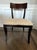 A subtle nod to Old Hollywood with clean lines and dramatic appeal, this side chair seamlessly complements a variety of...