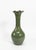 Hand-thrown studio pottery vase by North Carolina potter Matthew Nance. This distinctive vessel features a rich green...