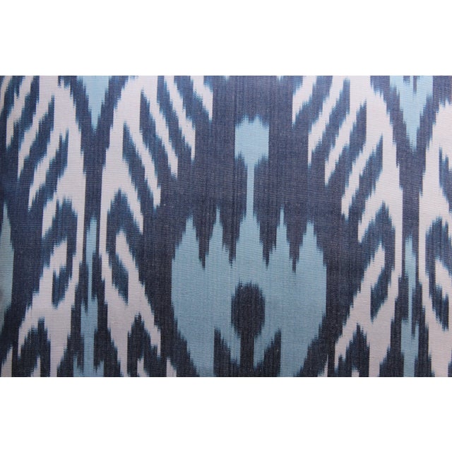 Bohemian silk ikat pillow with vibrant colors of blue, white . Super hand soft. Pillow has a zipper for closure. Insert is...