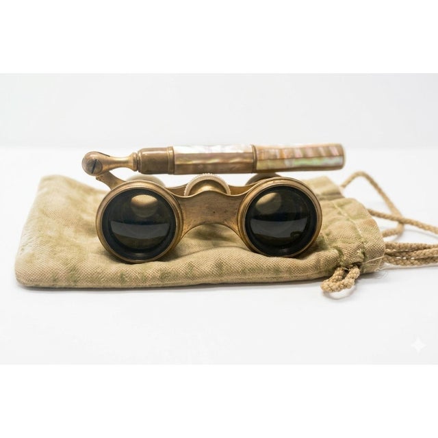 Step into the elegance of the Belle Époque with this exquisite pair of French opera glasses. Crafted in Paris by the...