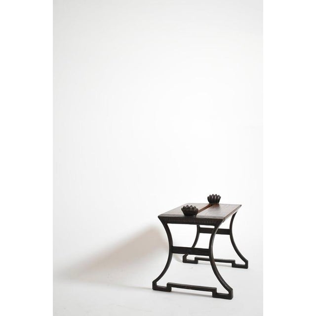 Folke Bensow cast iron and wood bench, 1920s. Height: 50 cm - 19.69 in Length: 65 cm - 25.59 in Width: 45 cm - 17.72 in...