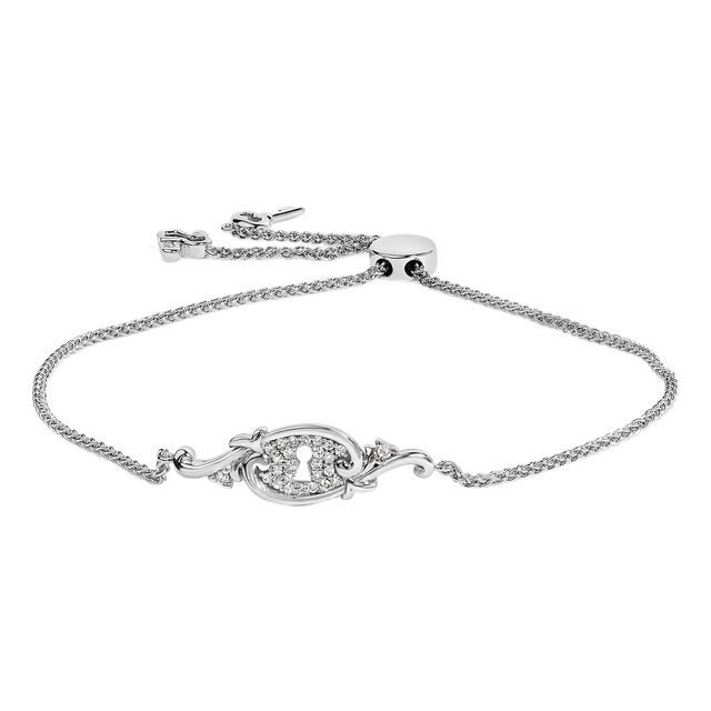 Sterling Silver 1/10 Cttw Diamond Keyhole Charm Bolo Bracelet For Sale