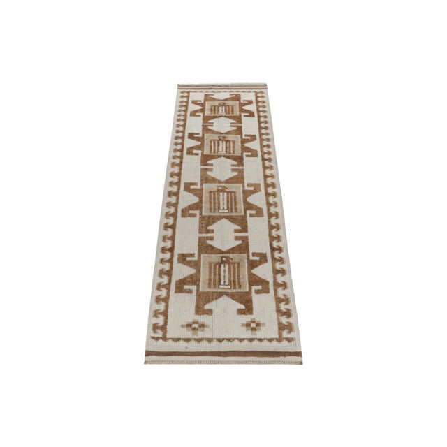 From Rug & Kilim’s vintage selections, a 3x10 hand-knotted wool runner from Turkey bearing nomadic design aesthetics. The...