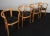 Farstrup set of four armchairs, lacquered beech Upholstered with black pure full grain aniline leather. Made by Farstrup....