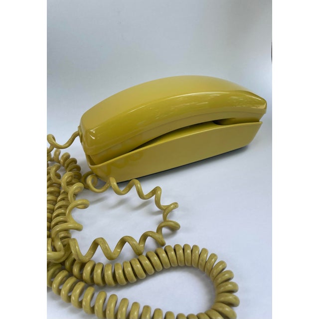 Here’s a phone that can bring you some nostalgia. A Trimline phone in the fantastic color of yellow from the 1980s. I have...