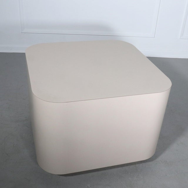 Modernist laminate table with plinth base. In the style of Karl Springer. Wonderful vintage condition. 30”W x 30”D x 22”H