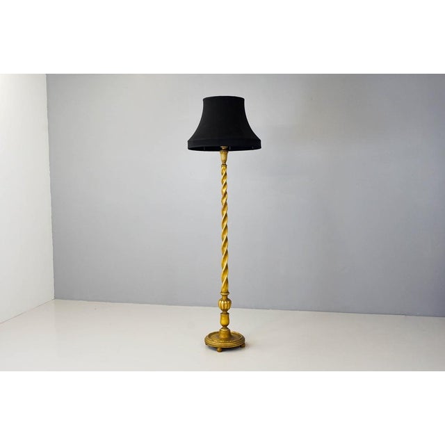 Standard lamp with gilded barley twist column. england circa 1950 h 192cm x w 36cm x d 36cm this piece is designed in the...