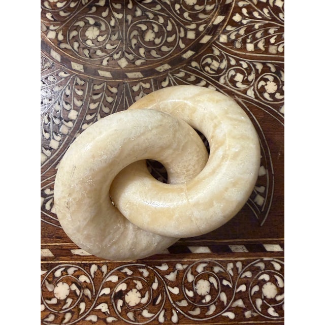 Handmade vintage beige marble knot paperweight, decorative book topper, coffee table decor.