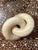 Handmade vintage beige marble knot paperweight, decorative book topper, coffee table decor.
