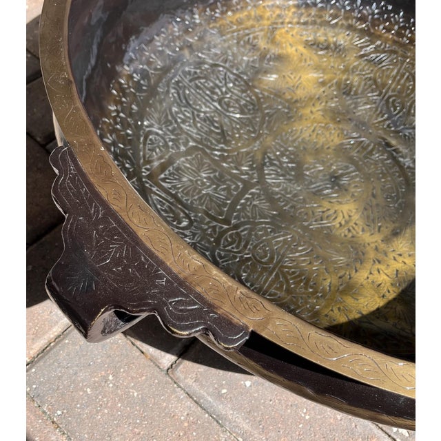 This is a very large (29 in) brass, beautifully etched, and hand-hammered Indian Urli Bowl. These traditional Indian bowls...