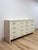 This eight-drawer dresser from Mitchell Gold + Bob Williams brings a coastal-contemporary sensibility to bedroom storage,...