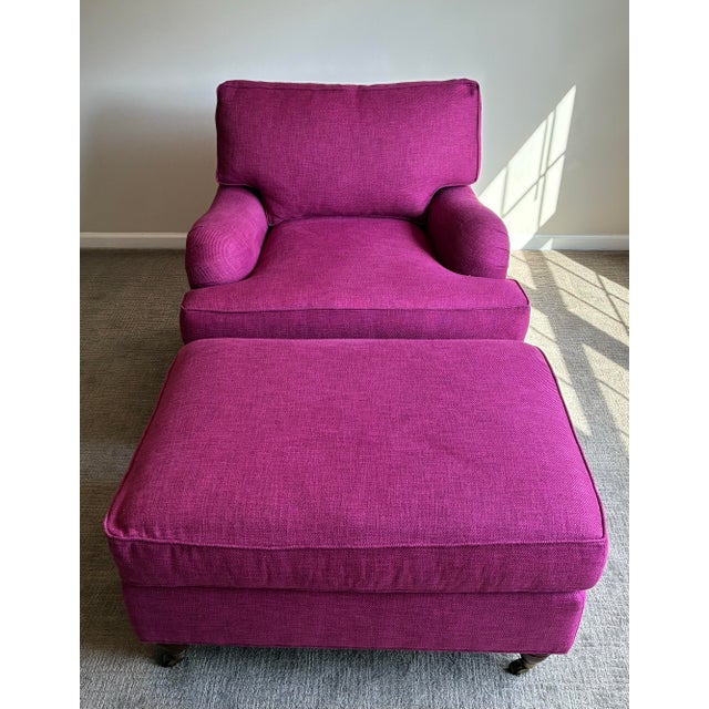 Beautiful oversized Baker lounge chair paired with matching ottoman, upholstered in a vibrant fuchsia raspberry textured...