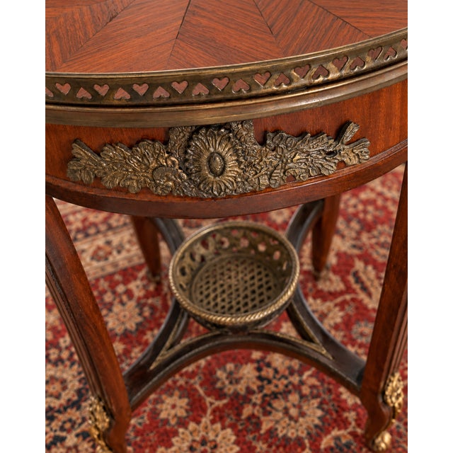 Late 19th Century Old World Elegance | Antique French-Style Marquetry Guéridon Table With Brass Mounts and Decorative Basket For Sale - Image 5 of 10