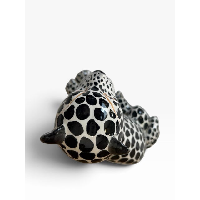 This is a vintage pair of Italian Majolica ceramic leopard figurines, circa 1970s, featuring one seated leopard and one...