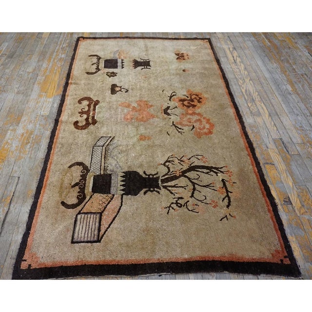 Wool Floral 1920s Brown Earth Tone Antique Hand Knotted Pile Rectangle Rug, Circa Date: 1920s. This exceptional piece...