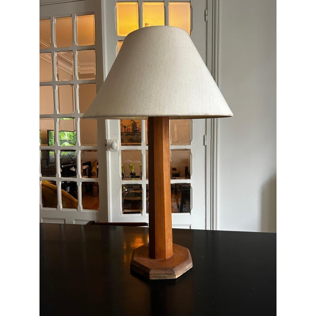 Modernist lamp in carved wood from the 1930s/40s base height 45cm, diameter 17cm European Plug (up to 250V).The wiring of...