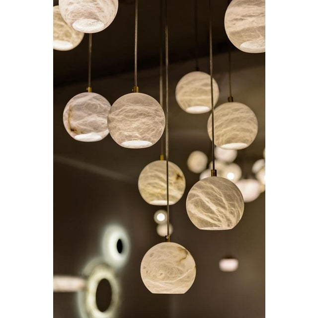 Set of 9 rain balls pendant lamps by united alabaster dimensions: ⌀ 14 x h 18 cm (customizable height) materials:...