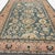 This vintage Sultanabad-inspired rug captures the timeless elegance and decorative richness of classical Persian design,...