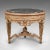 This is a grand vintage circular table. A Continental, giltwood and marble centrepiece table in Rococo revival taste,...