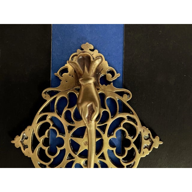 Lovely 1940s brass diamond-shaped door knocker in its original finish with an elegant Victorian style female hand and...