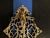 Lovely 1940s brass diamond-shaped door knocker in its original finish with an elegant Victorian style female hand and...
