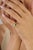 This pinky dome ring showcases a 0.61 carat natural heart-cut emerald set in a 14K yellow gold. The emerald measuring 3.5...