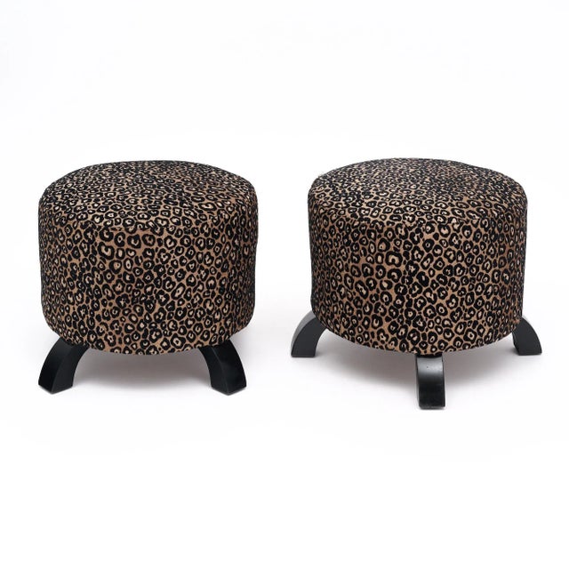 Pair of stools from Art Deco period France. Each stool has a cylindrical seat upholstered in the original black and gold...
