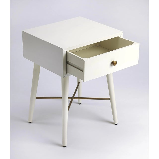 With Mid-Century Modern roots, this classic rectangular nightstand is both good-looking and functional. Crafted from bayur...