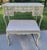 French Provincial vanity with flip top mirror and padded bench with cream painted finish and elegant gold detailing. Made...