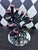 Sculptural handblown art glass Hanukkah menorah by Michael Hudson of Hudson Glass. The nine-light form is composed of...