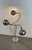 Sculptural Space Age floor lamp crafted in chrome-plated metal, featuring a weighted circular base and three flexible...