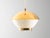 This large vintage pendant light features a refined combination of brass and engraved opaline glass. Its balanced...