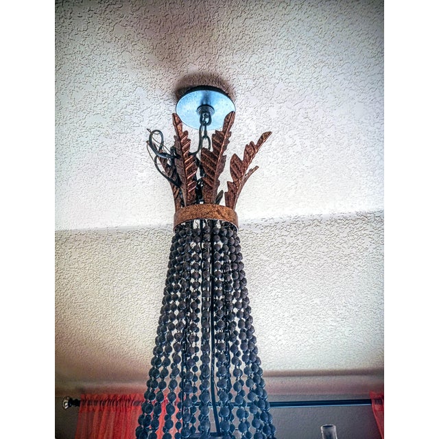 Gilt Bronze Empire Chandelier Design. Antique Bronze, Gold Finish. Wrought Iron Metal. Aged Wood Beaded. 12-Light Candle...