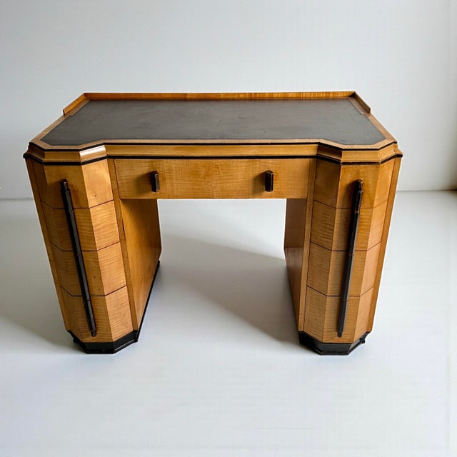 Art deco desk in satin birchwood attributed to heal’s, london. a fine art deco desk attributed to heal’s of london, dating...