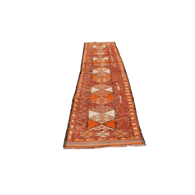 Handknotted vintage decorative Herki runner from Northern Iraq. Approximately 50-60 years old. In very good condition.