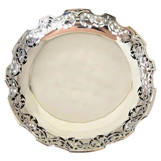 A fine vintage sterling silver fruit bowl or cake dish dating to 1972, displaying elegant traditional English silver...