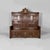 Italian vintage wood chest with decorations, 1930s Solid wood chest with rich gothic-style carvings. The high back is...