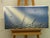 A striking modern seascape featuring sailboats gliding through shimmering waves beneath radiant beams of light. This piece...