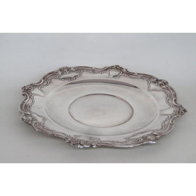 This lovely Rounded Platter is silver plated. This gorgeous serving tray was made by Gorham in the mid-twentieth century...