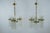 Elegant pair of Italian chandeliers designed by Gaetano Sciolari and produced in the 1970s. Each fixture features a...