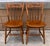 Beautiful pair of vintage Nichols and Stone solid maple wood side chairs. Beautiful stenciled design. Marked on bottom as...