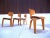 This set of four dining chairs was designed by the famous German architect Egon Eiermann, and was manufactured in Germany...