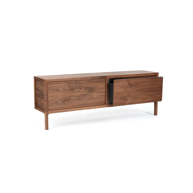 Less walnut cabinet by Mentemano Dimensions: W200 x D 44 x H 72 cm Materials: Walnut The design comes from a subtraction...