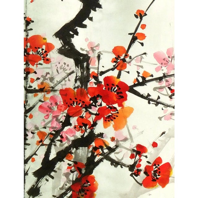 Hand-pulled Chinese silk serigraph of spring plum blossoms with title and seal upper right. Displayed on a white mat with...
