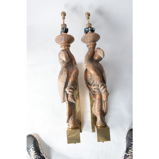 Manufactured by Hart & Associates a large pair of parrot sconces mounted on large brass boxed back plates. Each sconce...