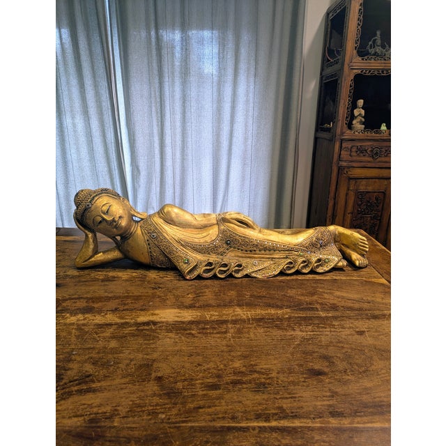 Traveling Man Treasures is selling this handcrafted 1930s-1940s Giltwood Burmese Reclining Buddha, a significant...