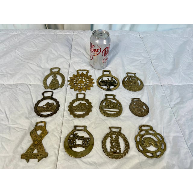 Set of 12 antique English horse brass ornaments. Horse brasses were used to decorate shire and parade horses for special...