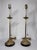 Pair of antique brass acanthus leaf tall buffet table lamps with brass pull chains and black marble bases. The long pull...