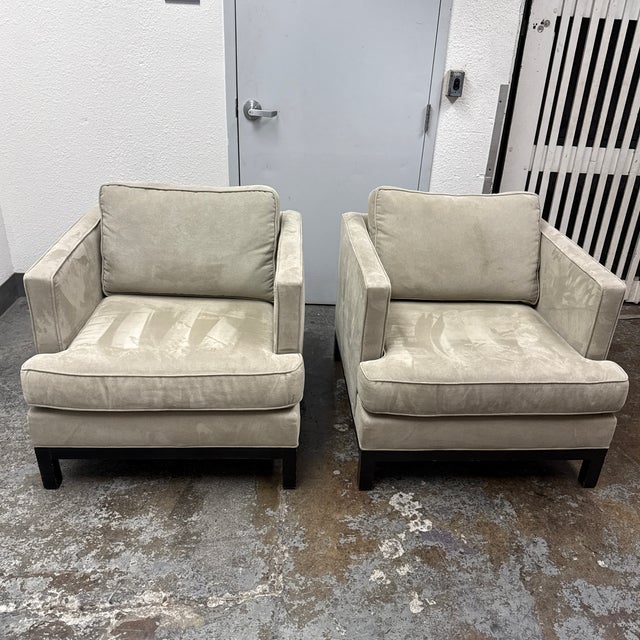 Design Plus Gallery presents a pair of the Lounge Armchairs from Crate & Barrel. Each chair has a squared profile defined...